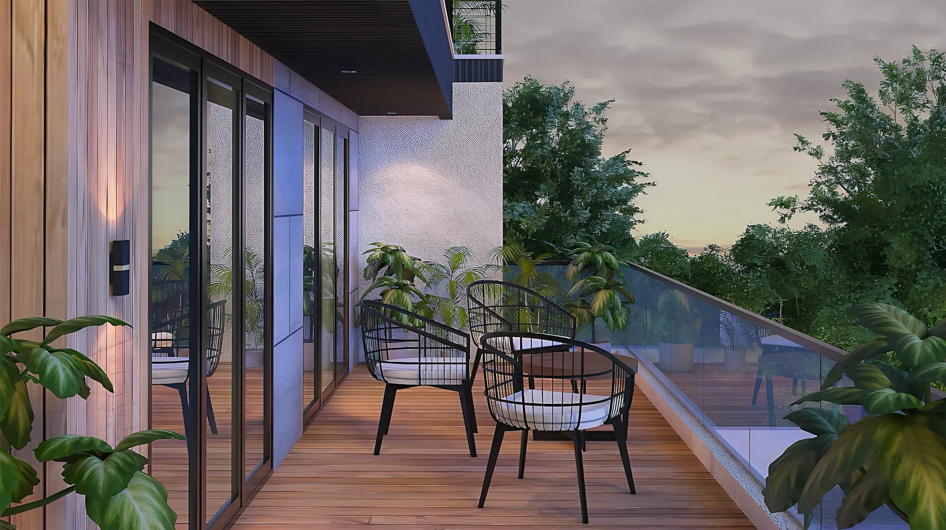 Timber-decked balcony with sliding glass doors and two chairs at dusk