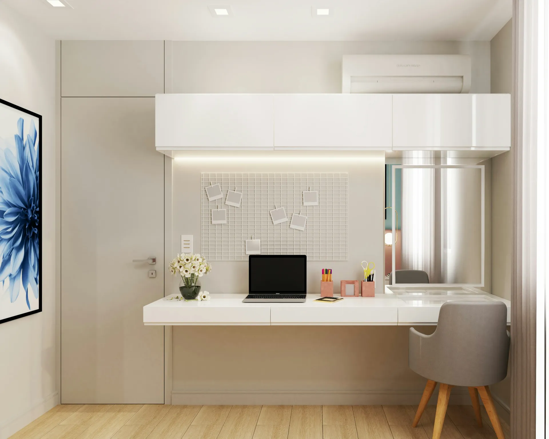 Floating white desk beneath built-in overhead cabinets in a small study nook